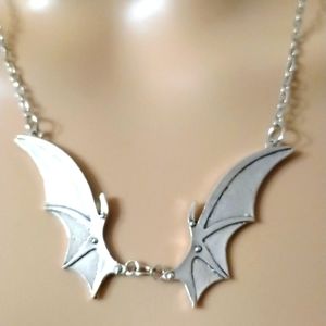 🦇 Cool stainless steel bat wing necklace and a pewter dragon/bat wing